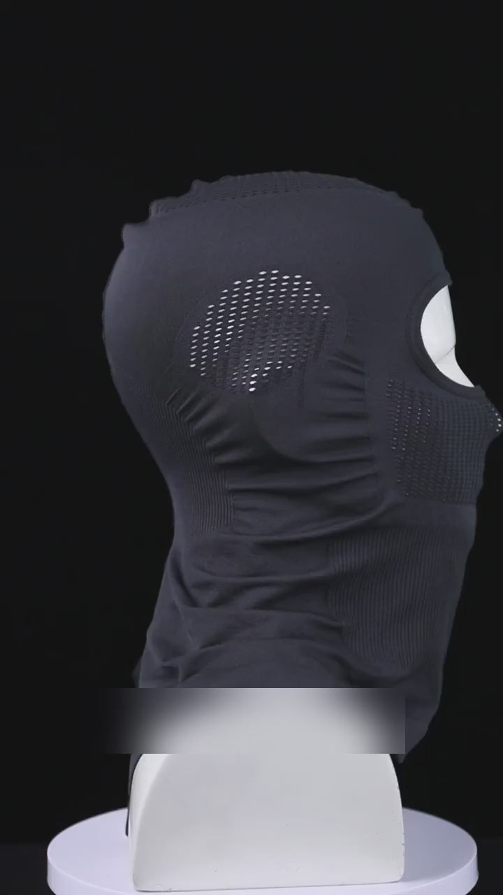 Breathable full-face balaclava on a display head, the mesh fabric stretched between two hands, then worn by a man with sunglasses.