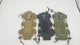 MOLLE water bottle pouch in green, tan and black, held up and turned to show the webbing, the straps and the top closure.