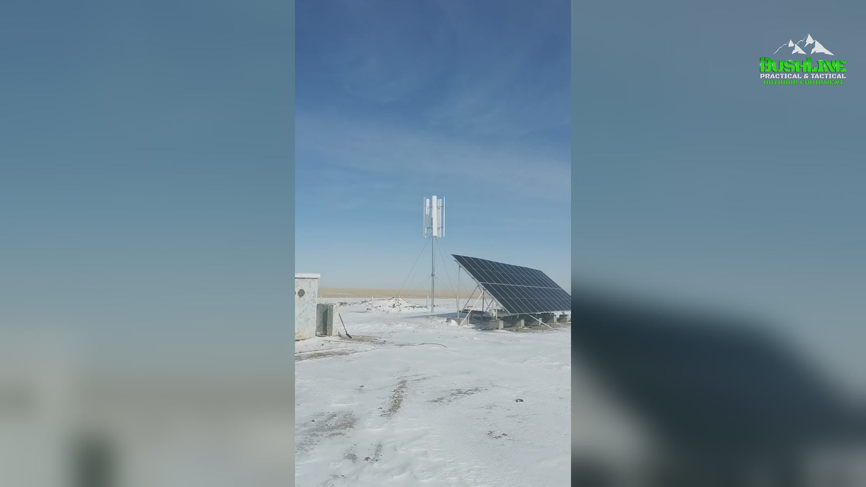 Video: an H2000 vertical wind turbine turning on its mast beside a solar array on a snowy plain, with captions for the 2000 W rating at 11 m/s, 2.1 m rotor, 2.5 m/s start-up and 50 m/s safe wind speed