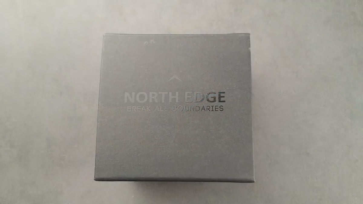 The North Edge Gavia unboxed, its steel case and link band turned in the hand, then the buttons pressed to set the hands and step through the altimeter, barometer, compass and dive modes.