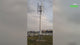 Video: H1000 vertical wind turbines turning on their masts at a roadside installation, including a crane lifting the rotor, with captions for the 1000 W rating at 11 m/s, 2.5 m/s start-up and 50 m/s safe wind speed