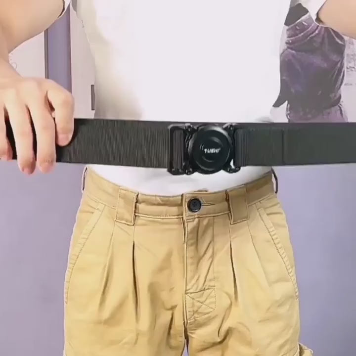 Rotary quick-release belt fed through trouser loops, the webbing pulled through the buckle and the buckle turned to release it.