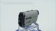 ARTBULL LS-1000 laser rangefinder turning on a stand, a man sighting with it on a boardwalk, the buttons pressed, the view through the reticle, then him walking with it.