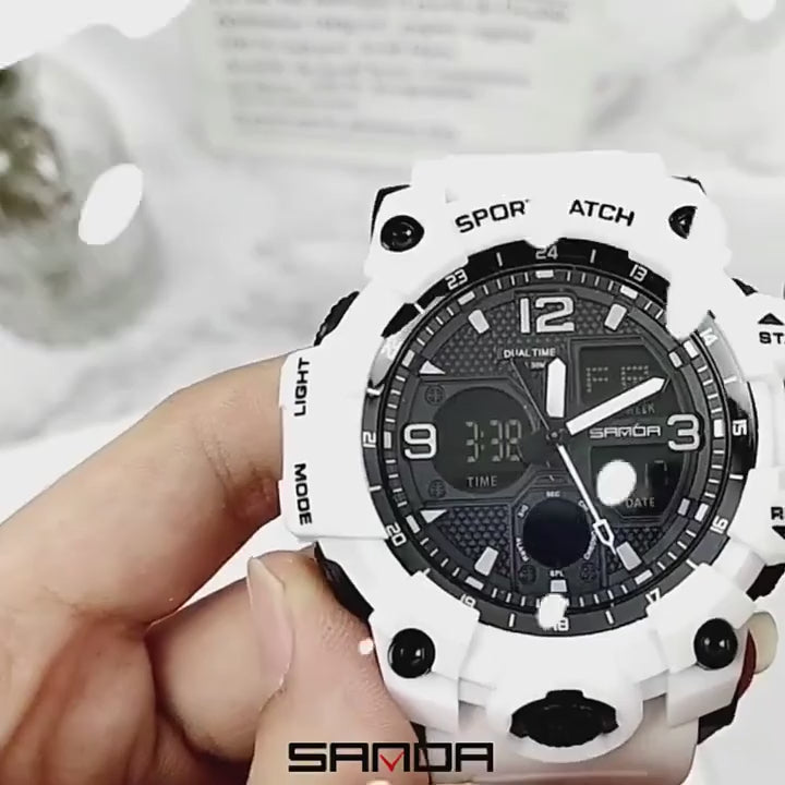 The white SANDA 6030 turned in the hand with its digital readout lit, the back and strap buckle shown close up, then the watch beside black and black-and-gold versions.