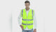 Model wearing the multi-pocket hi-vis vest in fluoro yellow, then in black, showing the reflective tape and the pockets.