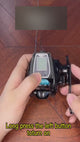 SAMOLLA electronic reel held in the hand, the buttons pressed to show the line counter, the bite alarm and the line-length settings on its screen.