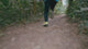 A runner on a forest trail checking the Mibro GS Active on his wrist, close-ups of the watch on rock and sand, a route in the phone app, and the four colours lined up at the end.