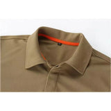 Close-up of the khaki polo collar with an orange inner band