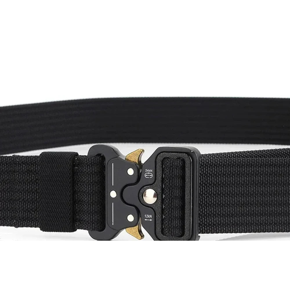 Black two-lever quick-release buckle closed on black webbing, stamped 12kN and 24kN
