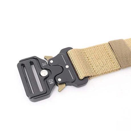 Quick-release buckle unclipped, the tongue and the receiver shown apart on khaki webbing