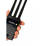 Hand holding the G618 RF detector at an angle, showing the LED signal meter and the three antennas