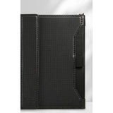 Black passport holder closed, woven-texture cover with an elastic strap and a D-ring at the top corner