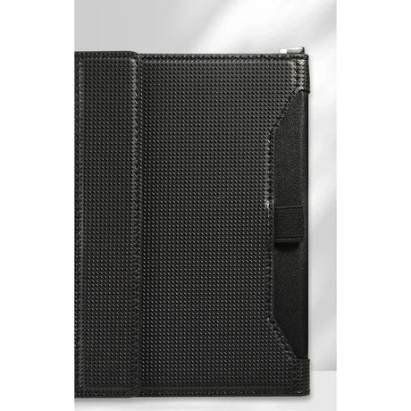 Black passport holder closed, woven-texture cover with an elastic strap and a D-ring at the top corner