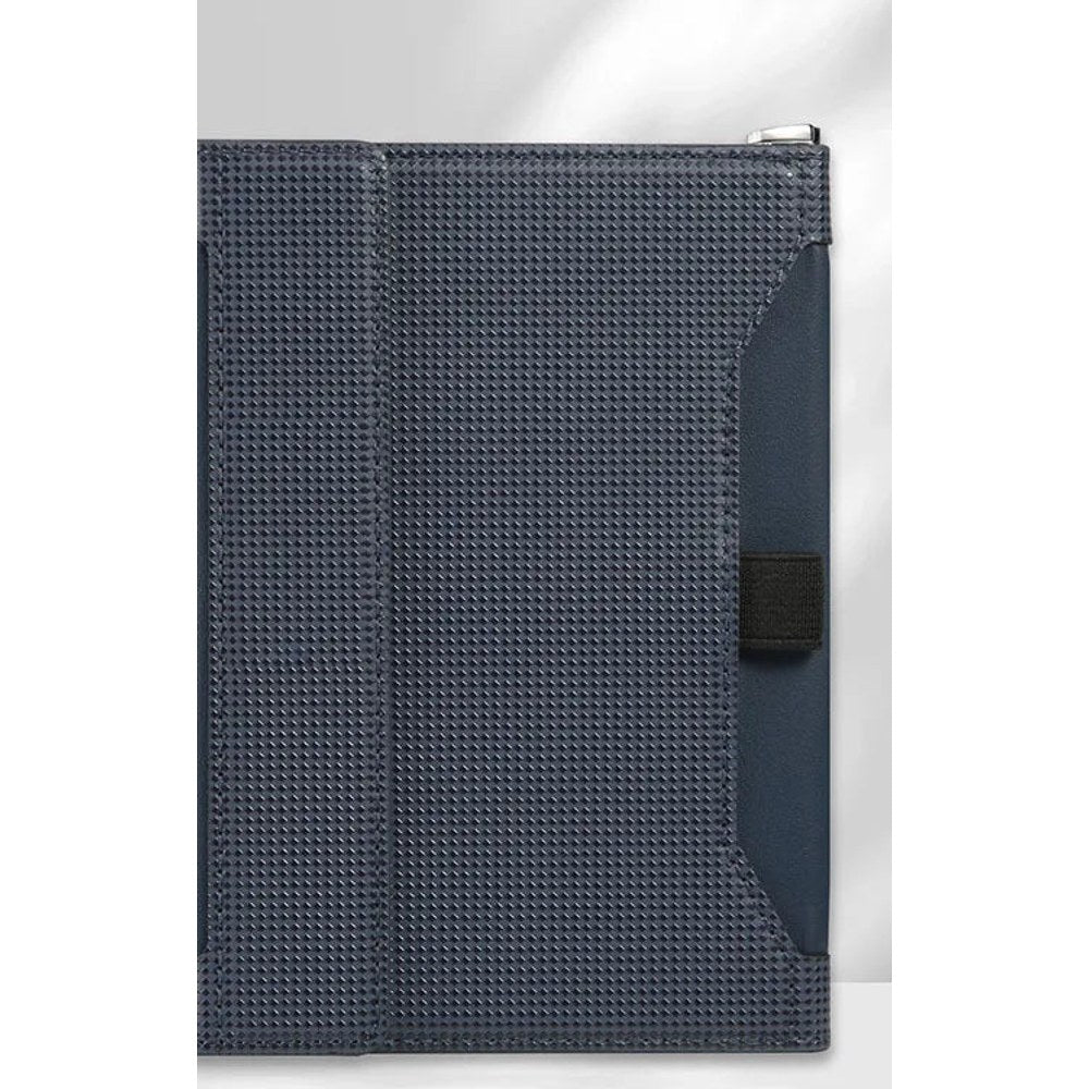 Royal blue passport holder closed, woven-texture cover with a black elastic strap