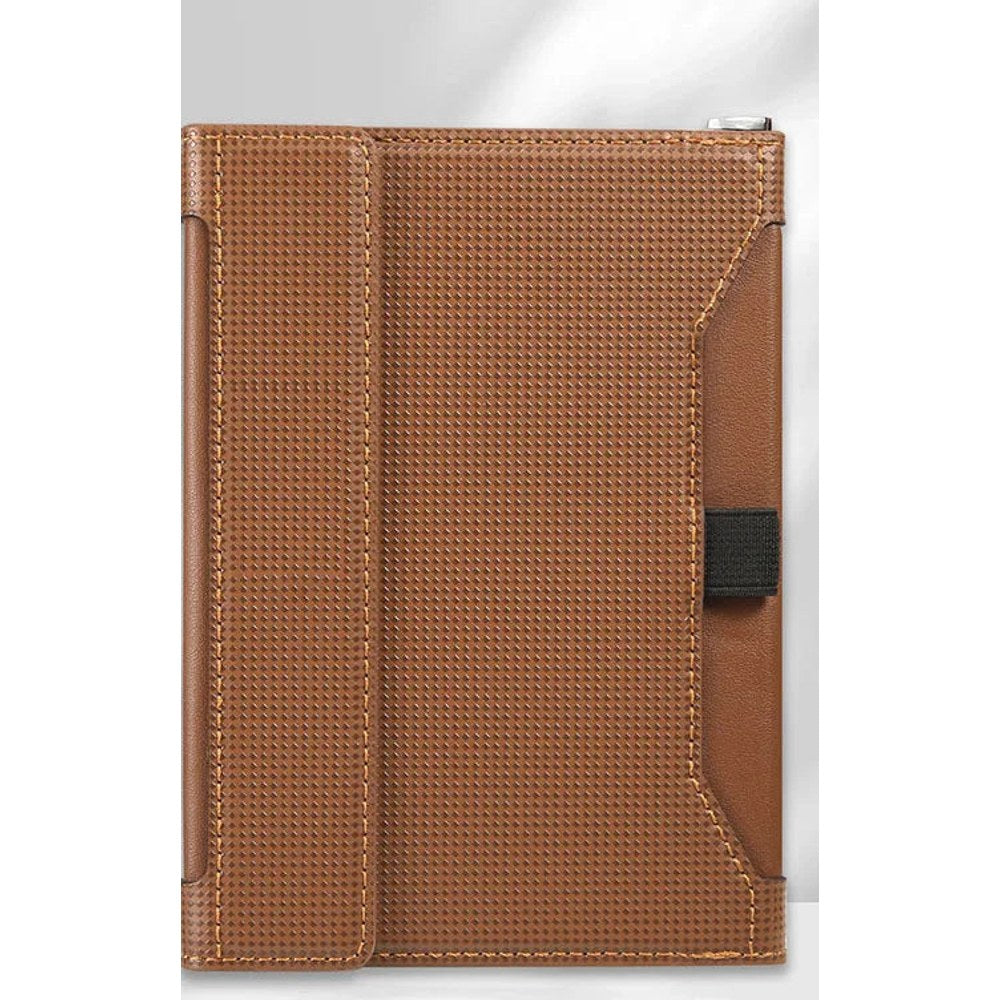 Brown passport holder closed, woven-texture cover with a black elastic strap