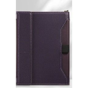 Dark purple passport holder closed, woven-texture cover with a black elastic strap