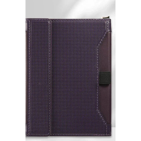 Dark purple passport holder closed, woven-texture cover with a black elastic strap