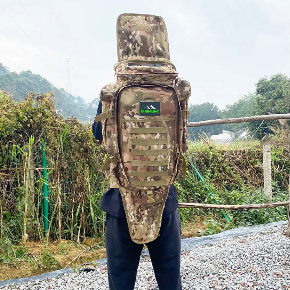 Camo tactical backpack with full-length tool sleeve worn on a person's back, outdoors