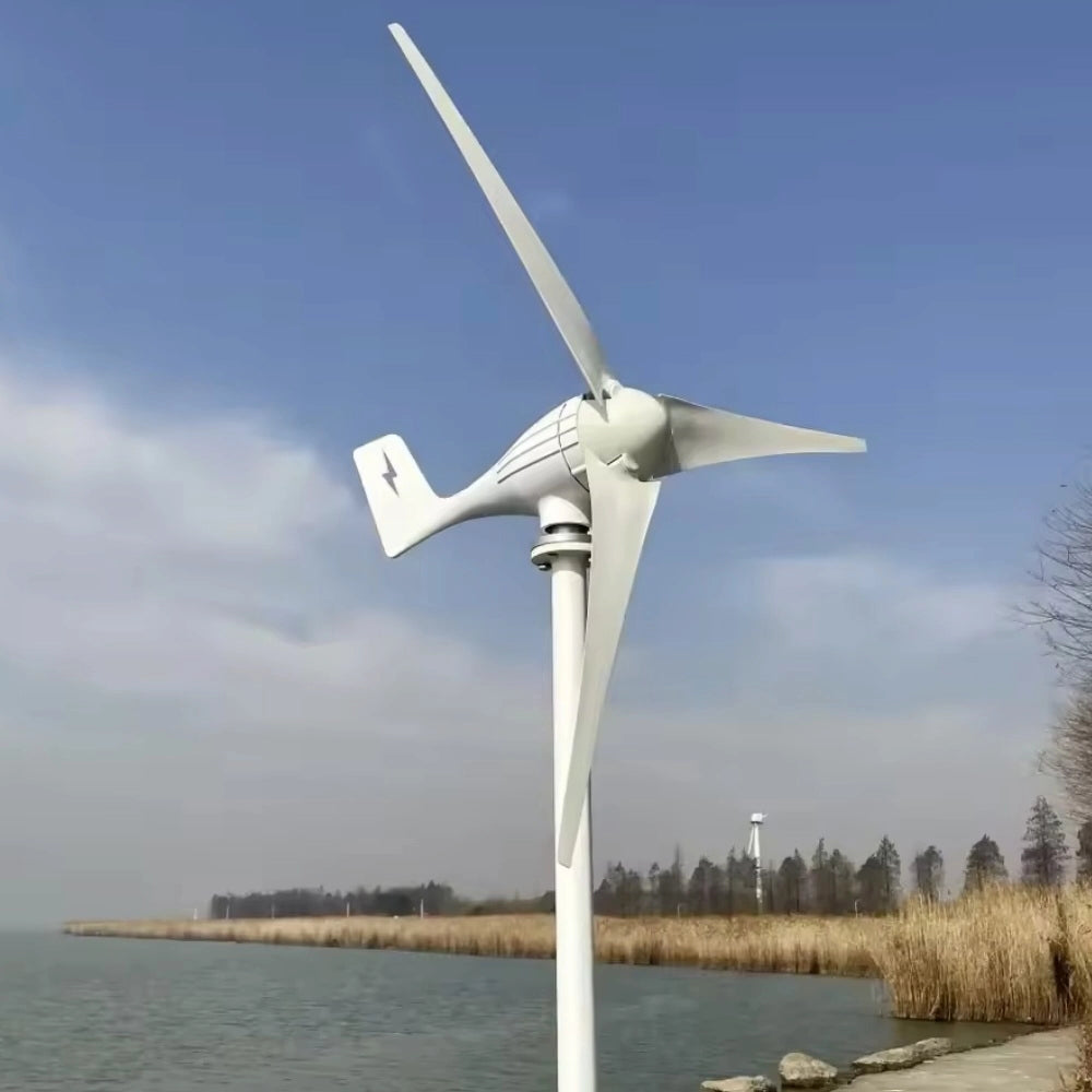 S4-400 three-blade horizontal wind turbine with its lightning-bolt tail fin, pole-mounted above a lakeshore with winter reeds behind