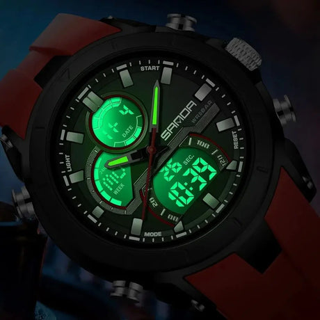 Close-up of the SANDA 6279 dial in the dark with the backlight on and the digital windows lit green