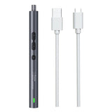 Grey precision electric screwdriver handle with its button controls and green light, beside a white USB-A to USB-C charging cable