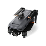 SG909MAX folded, with the obstacle-avoidance module clipped on top, on white