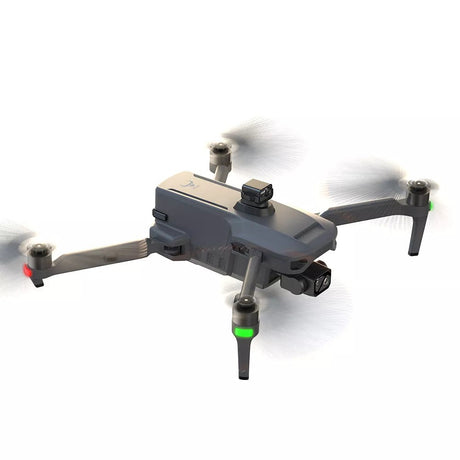 SG909MAX in flight, seen from the side and slightly above, on white