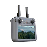 SG909MAX touch-screen remote seen from the side, antennas raised, on white