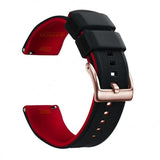 Black silicone band with a red inner face and a rose-gold buckle