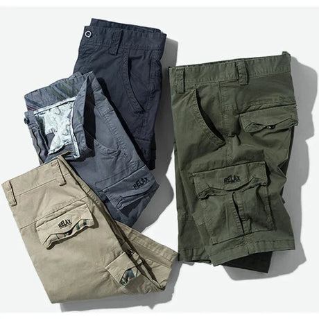 RELAX cargo shorts in dark grey, grey, khaki and army green folded and stacked together, RELAX embroidery showing on the khaki and army green flaps