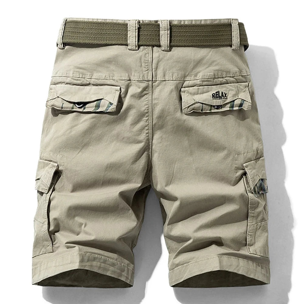 Khaki RELAX cargo shorts from the back: two flap-covered rear pockets, RELAX embroidery on the right flap, camouflage trim under the flaps, styling belt through the loops