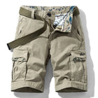 Khaki RELAX six-pocket cargo shorts laid flat, front view, fly open to show the printed inner waistband, with an olive webbing belt used for styling
