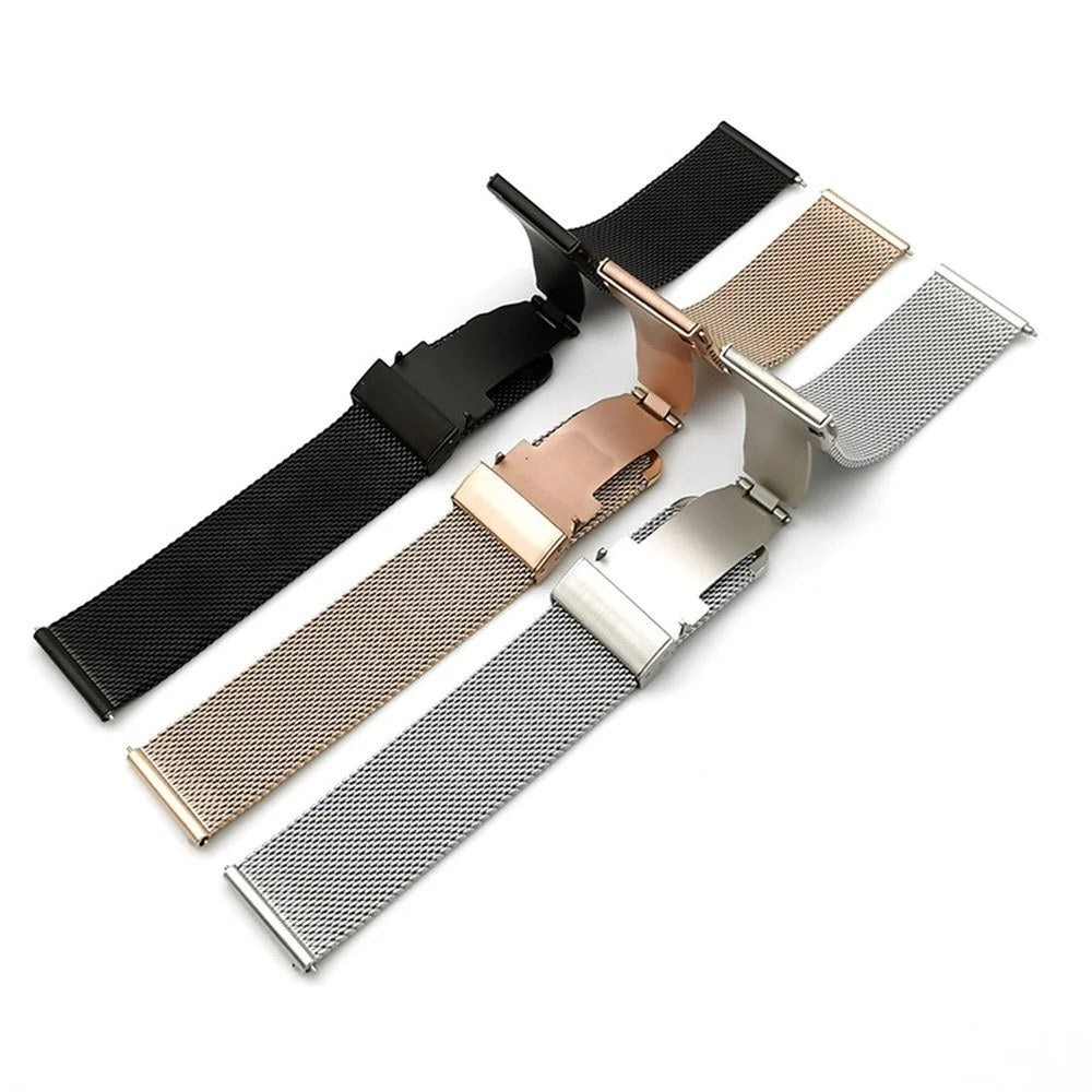 Three mesh bands in black, rose gold and silver with the folding clasps open