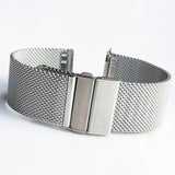 Silver stainless steel Milanese mesh watch band with a folding clasp, shown with the spring-bar tool and pins