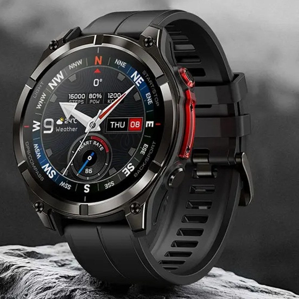 Close-up of the Black Stratos 4 Pro case, bezel screws and red side button, on a rock