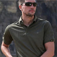 Man wearing the army green tactical polo shirt, chest and sleeves