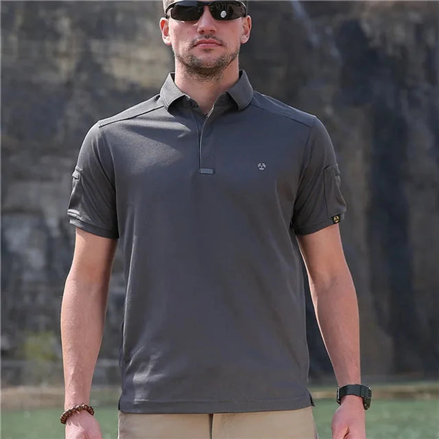 Man wearing the grey tactical polo shirt, front view