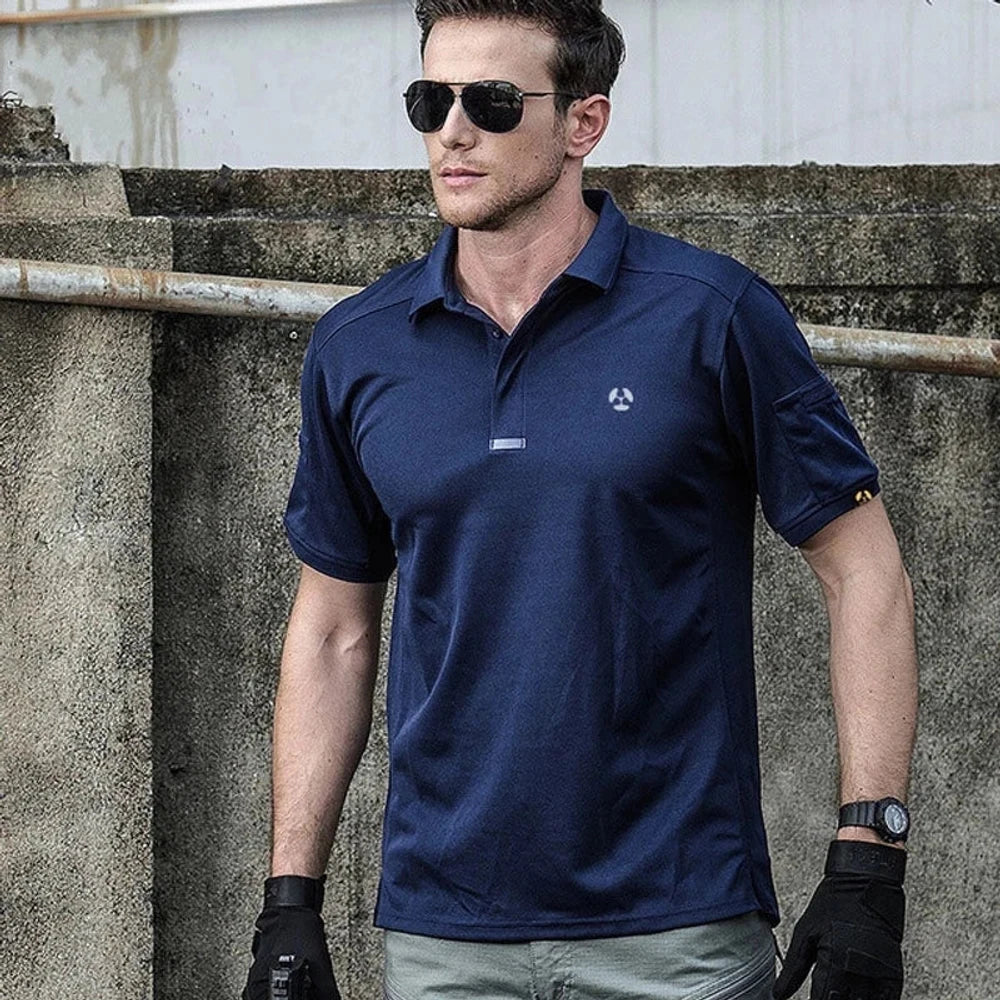 Man wearing the navy tactical polo and gloves
