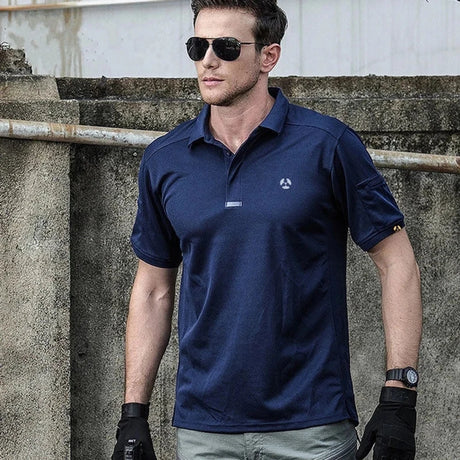 Man wearing the navy tactical polo and gloves