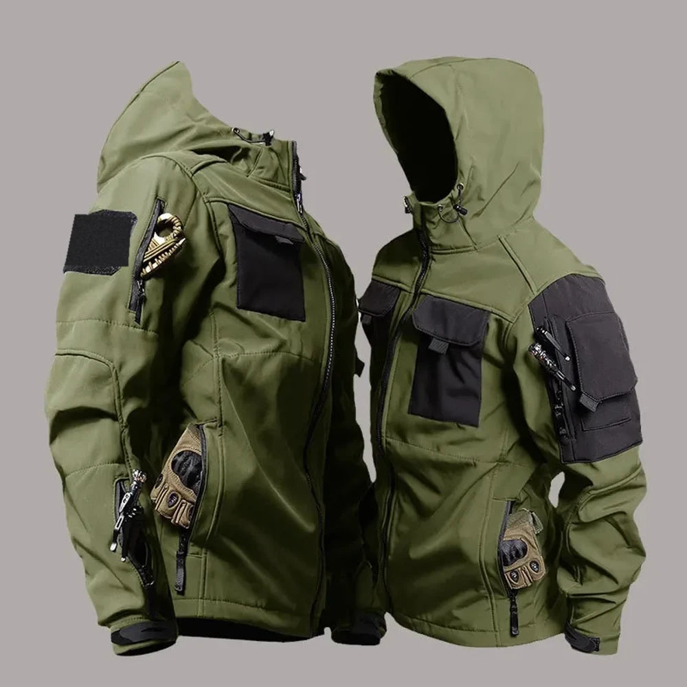 Green softshell jackets on a grey backdrop, front and hood-up views; clip and gloves not included