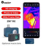 TOOLTOP T7 thermal camera plugged into an Android phone showing a thermal picture of a motor, with the optional macro lens (not included) beside it