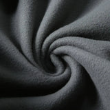 Close-up of the grey polyester fleece fabric