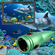 Green aluminium underwater camera with infrared LEDs beside the 7 inch colour monitor