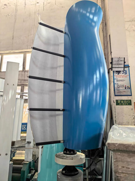 A blue tulip turbine in the factory with one shell panel opened, showing the black cross-bars and inner frame - blue is not a stocked colour.