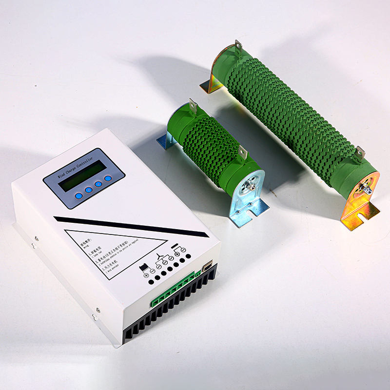 WCMD controller and the two sizes of green dump-load resistor laid out on white, seen from above at an angle.
