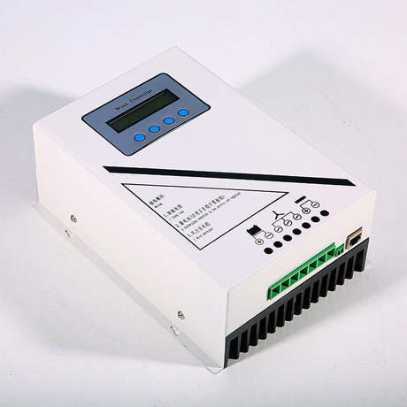 WCMD controller lying on its back, showing the green seven-way screw terminal strip, the communications socket and the finned black heatsink.