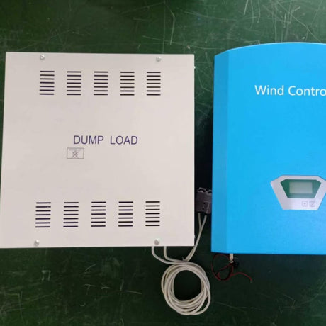 WW30 3 kW set: white DUMP LOAD box with vented panels, hot-surface warning and a cable with plug, beside the blue Wind Controller with LCD, on a green workbench