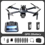 XT606 drone kit with screen remote and two batteries, plus spare propellers, USB lead, screwdriver and carry case