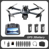 XT606 drone kit with screen remote and three batteries, plus spare propellers, USB lead, screwdriver and carry case