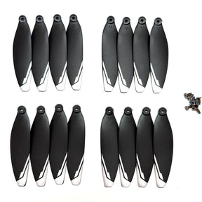 Sixteen black XT606 drone propellers with white tips and their mounting screws